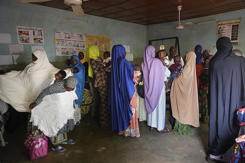 Women gather at a clinic to have their children vaccinated in Niamey, Niger, in August.
(AP/Sam Mednick)