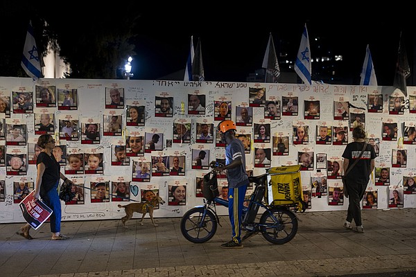 Palestinians break into Gaza UN aid warehouses as toll tops 8,000