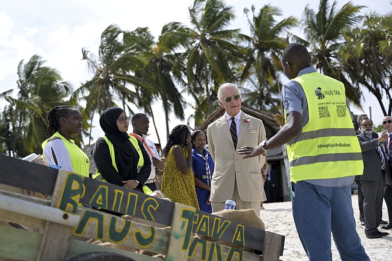 Britain’s King Charles III (center) meets members of Baus Taka Enterprise, a women and youth led enterprise that uses technology to enhance marine conservation efforts, during a visit to Nyali beach in Mombasa, Kenya, on Thursday.
(AP/Simon Maina)