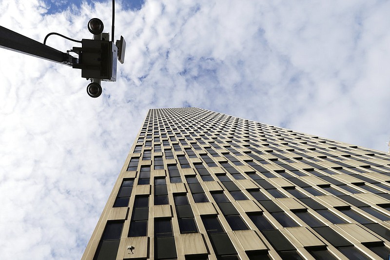 Security cameras are on a light pole outside the Jacob K. Javits Federal Building in New York in this March 30, 2017 file photo. Federal agencies with offices in the building are the FBI, the Department of Homeland Security, the General Services Administration, Housing and Urban Development, Small Business Administration, and the U.S. Citizenship and Immigration Services. (AP/Mark Lennihan)