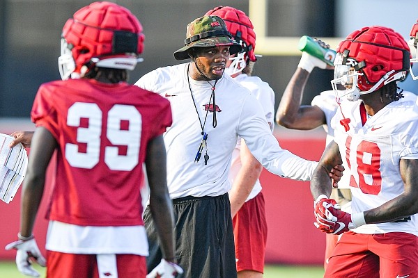 Arkansas assistant coach Kenny Guiton is shown during practice Friday, Aug. 4, 2023, in Fayetteville.