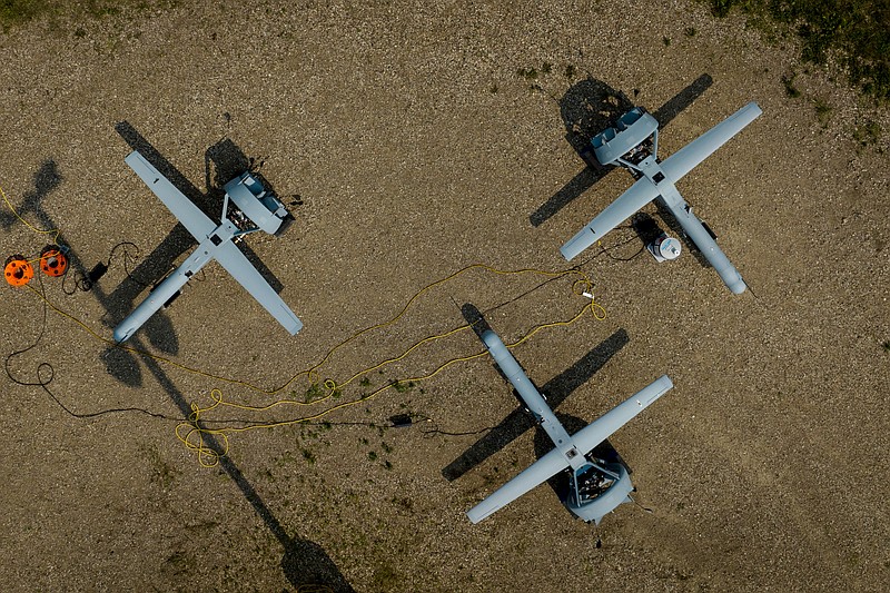 An overhead view of three of Shield AI’s V-Bat drones, which can operate both autonomously and as swarm with a program called hivemind, during testing near Devils Lake, N.D., June 26, 2023. The drone is run by artificial intelligence and the Israeli military is already using a smaller Shield AI drone with the same technology. But persuading a cautious Pentagon to embrace autonomous AI remains a big challenge. (Erin Schaff/The New York Times)