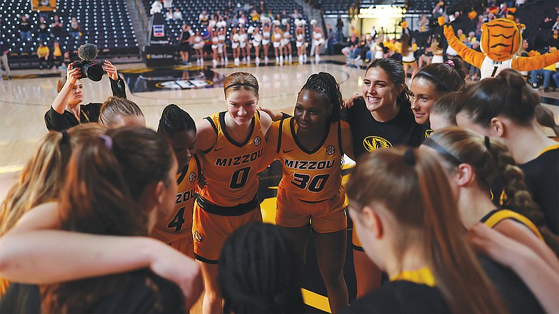 The Missouri women's basketball team huddles before Monday's game against Belmont at Mizzou Arena in Columbia. (Courtesy of Missouri athletic department)