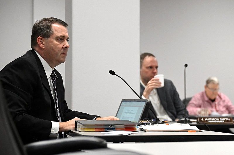 Chris Madison (left), legal counsel for the State Board of Election Commissioners, asks a witness a question during a board hearing in Little Rock in this Jan. 18, 2023 file photo. (Arkansas Democrat-Gazette/Stephen Swofford)