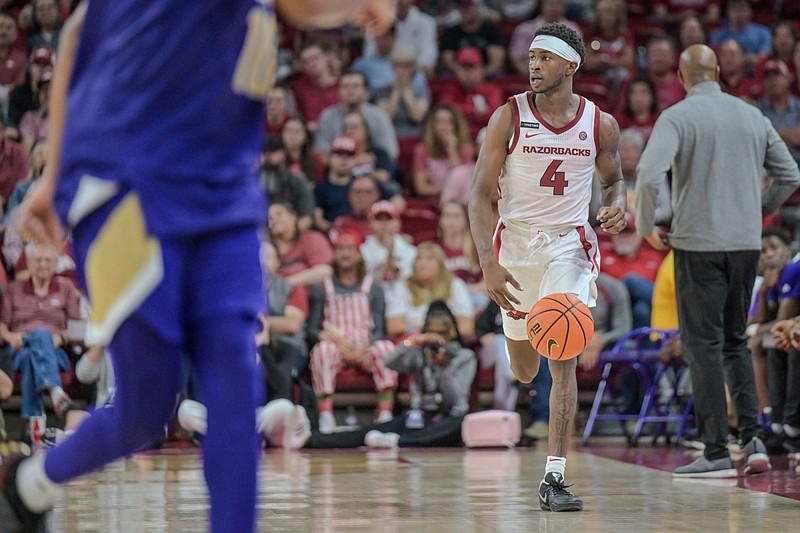 Davonte Davis brings the ball up the court in the second half against Alcorn State on Monday, Nov. 6, 2023, at Bud Walton Arena in Fayetteville. (NWA Democrat Gazette/Caleb Grieger)
