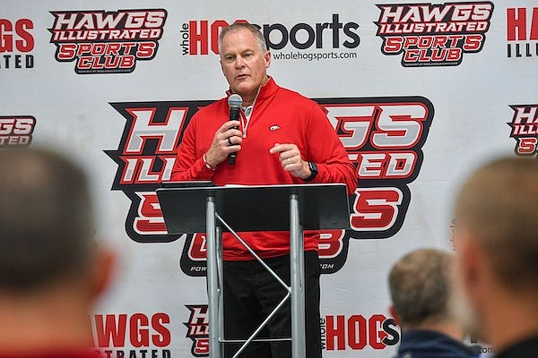 Arkansas Athletics Director Hunter Yurachek speaks Thursday, Nov. 9, 2023, at the Hawgs Illustrated Sports Club luncheon inside Home 2 Suites by Hilton in Springdale.