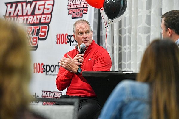Arkansas Athletics Director Hunter Yurachek speaks, Thursday, Nov. 9, 2023, at the Hawgs Illustrated Sports Club luncheon inside Home 2 Suites by Hilton in Springdale.