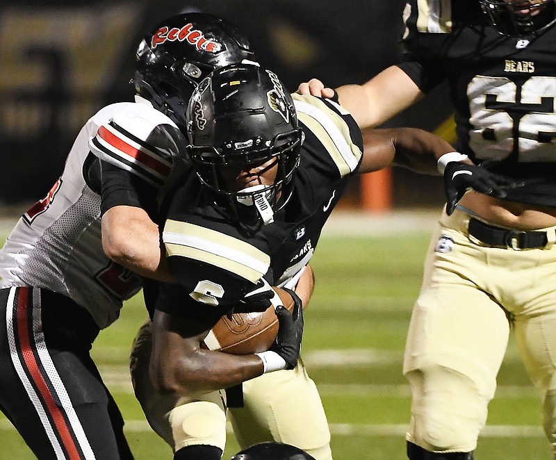 Staff photo by Robin Rudd / Bradley Central's Boo Carter struggles for extra yardage during the Bears' home win against Maryville on Friday night in the second round of the TSSAA Class 6A playoffs.