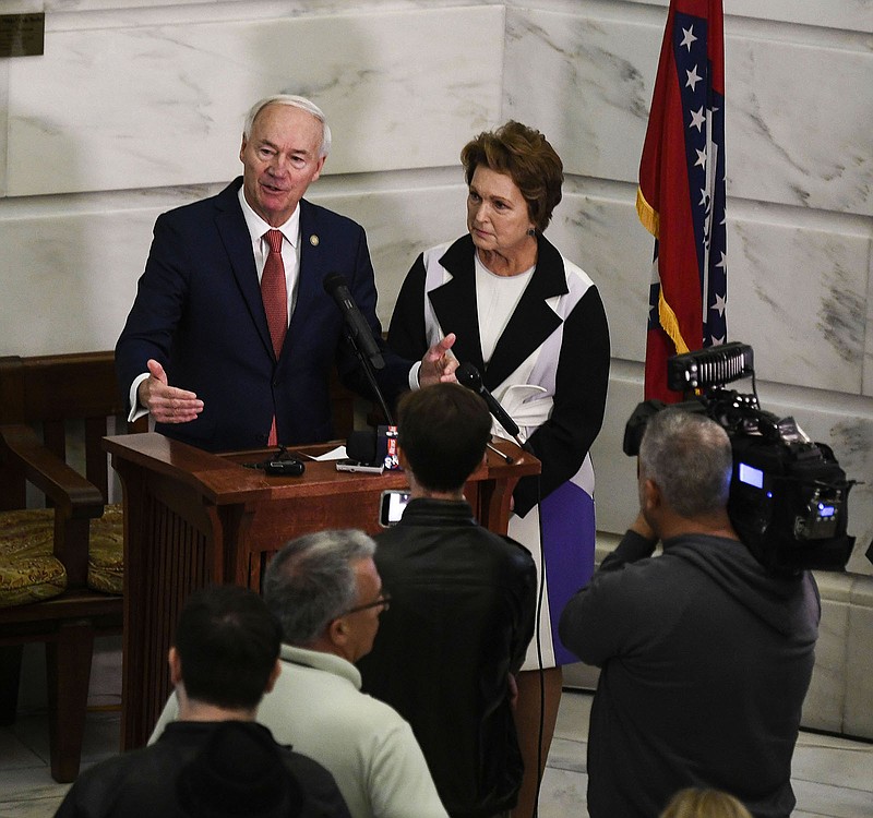 Asa Hutchinson addresses the media at the Arkansas Capitol on Friday after filing paperwork to be on the ballot as a candidate for president in the Republican primary next year.
(Arkansas Democrat-Gazette/Stephen Swofford)