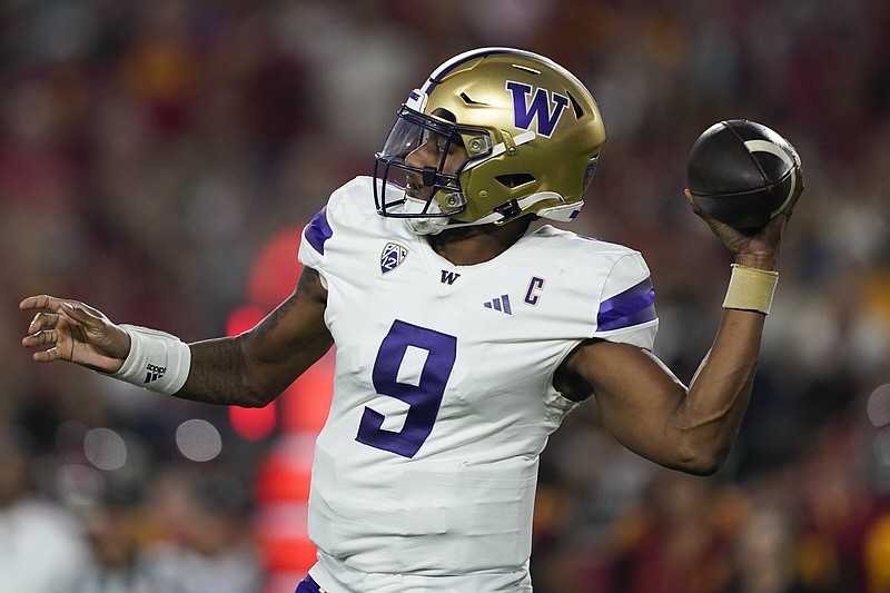 Washington quarterback Michael Penix Jr. throws a pass Nov. 4 during a 52-42 win over Southern California in Los Angeles. Penix has thrown for 3,201 yards and 26 touchdowns for the unbeaten No. 5 Huskies this season.
(AP/Ryan Sun)