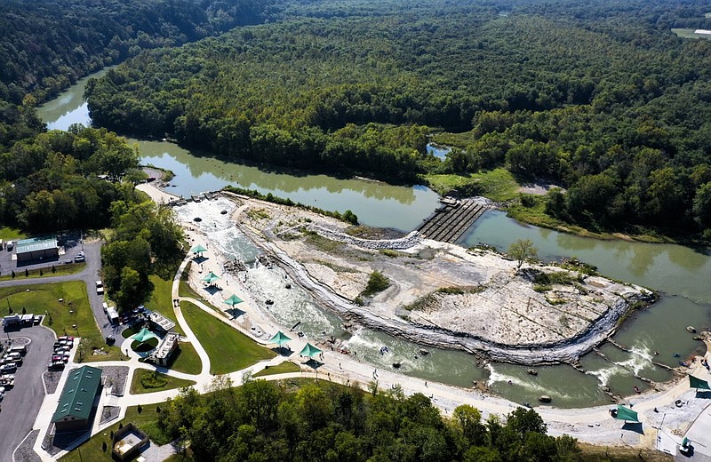 The Illinois River feeds into the the WOKA Whitewater Park in Watts, Okla., in this Sept. 15, 2023 file photo. The park is located about a mile downstream from Oklahoma's border with Arkansas. (NWA Democrat-Gazette/Charlie Kaijo)