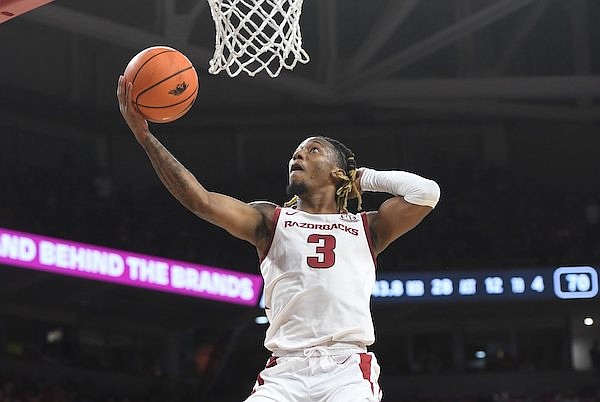 Arkansas guard El Ellis goes up for a layup during a game against Old Dominion on Monday, Nov. 13, 2023, in Fayetteville.