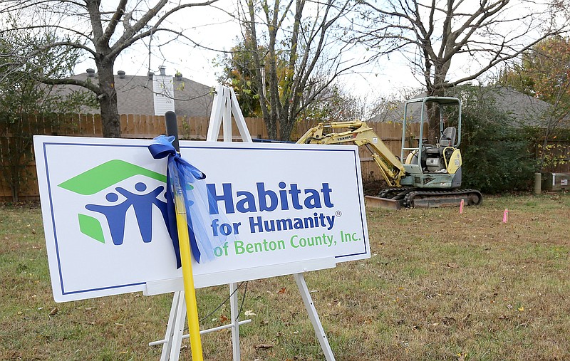 Cindy Acree (right), executive director Habitat for Humanity of Benton County, Inc., listens as Angela Sockrider speaks Monday, November 9, 2020, during a Habitat for Humanity of Benton County ground breaking event for a new home for Sockrider at 808 N. 31st Street in Rogers. Check out nwaonline.com/201126Daily/ and nwadg.com/photos for a photo gallery.(NWA Democrat-Gazette/David Gottschalk)