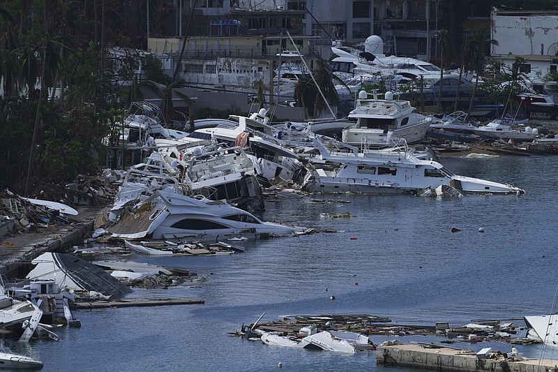 Yachts damaged and destroyed by Hurricane Otis fill a harbor in Acapulco, Mexico, earlier this month.
(AP/Marco Ugarte)