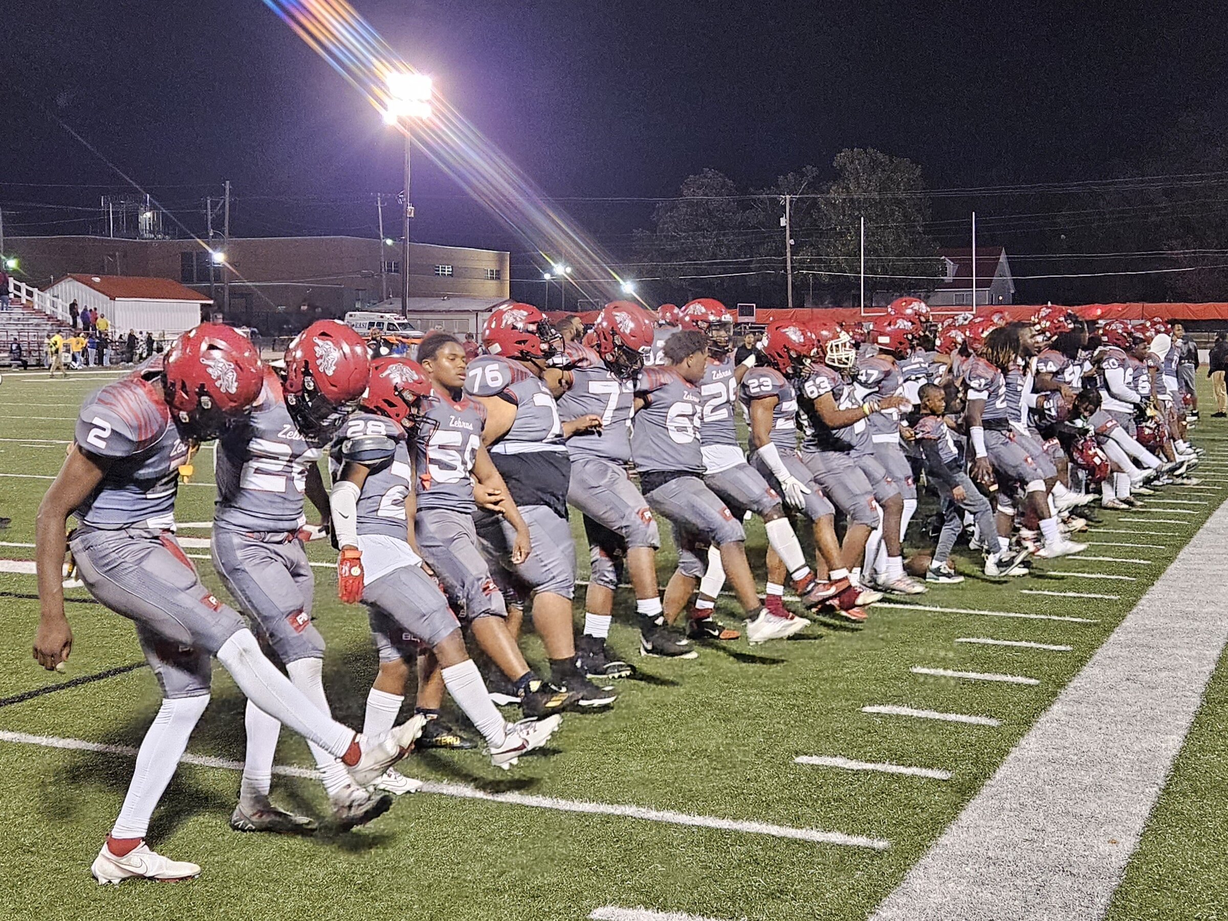 Five Holcomb touchdowns send Pine Bluff to semis