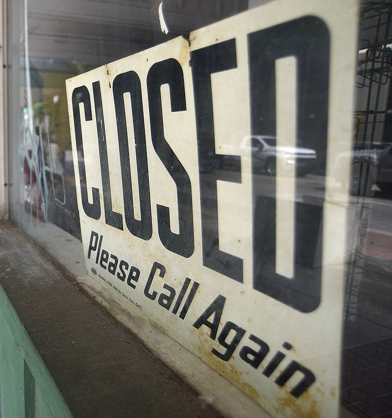 A “closed” sign.