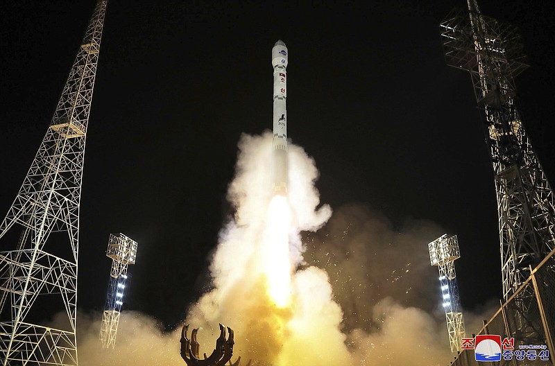 North Korean government shows what the country said is the launch of the Malligyong-1, a military spy satellite, into orbit on Tuesday.
(AP/Korea News Service/Korean Central News Agency)