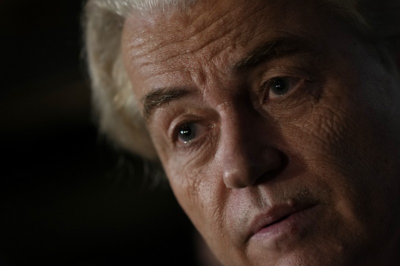 Geert Wilders, leader of the Party for Freedom, known as PVV, answers questions to media after announcement of the first preliminary results of general elections in The Hague, Netherlands, Wednesday, Nov. 22, 2023. (AP Photo/Peter Dejong)