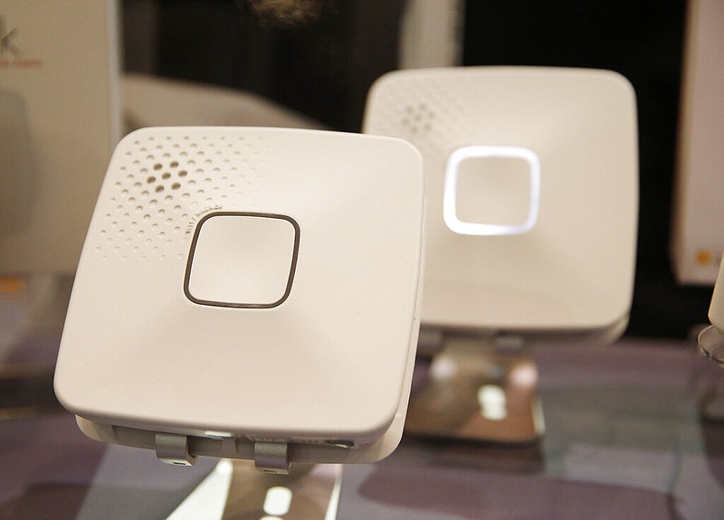 The First Alert Onelink Wi-Fi Smoke + Carbon Monoxide Alarm is on display at CES Unveiled, a media preview event for CES International in Las Vegas, in this Jan. 4, 2016 file photo. The device displayed at CES, short for the Consumer Electronics Show, monitors for smoke and carbon monoxide and can send alerts to a mobile device. (AP/John Locher)