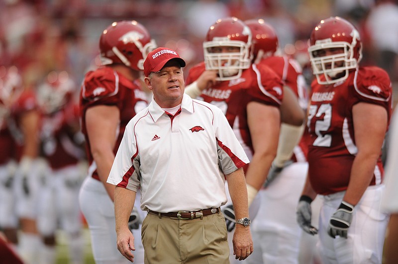 Bobby Petrino (above) coached four seasons at Arkansas (2008-2011) before being fired in April 2012. After coaching stops at Louisville, Missouri State and Texas A&M, Petrino is back with the Razorbacks, this time as offensive coordinator.
(NWA Democrat-Gazette file photo)