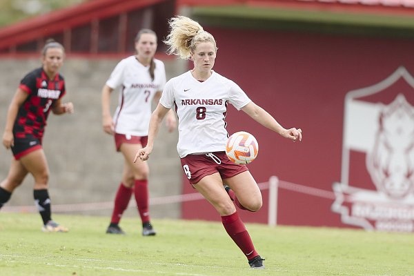Arkansas' Bea Franklin (8) runs the ball, Sunday, August 28, 2022 during a soccer match at Razorback Field in Fayetteville.