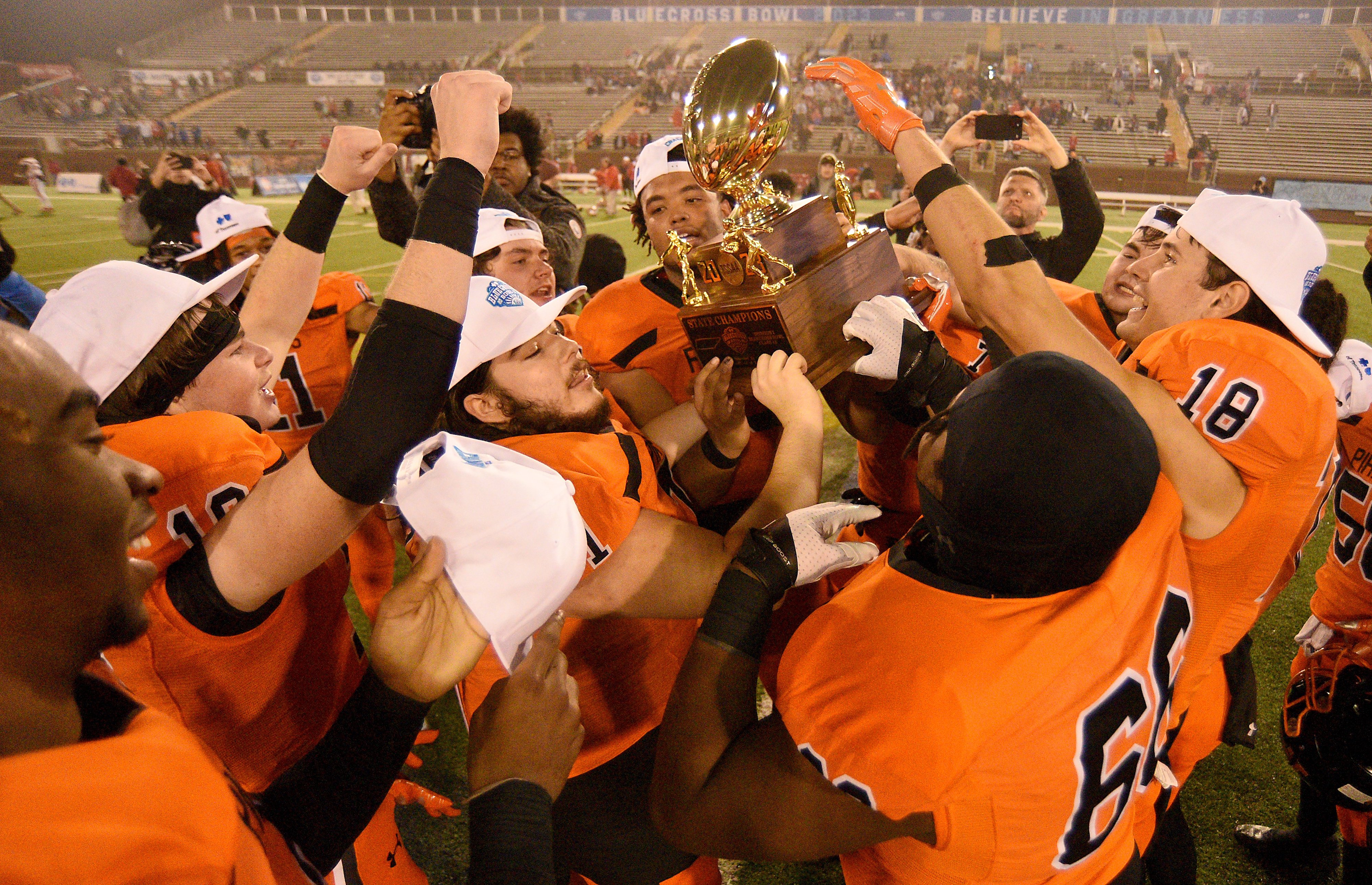 Staff photo by Matt Hamilton/ South Pittsburg players celebrate after defeating McKenzie in the BlueCross Bowl Class 1A championship game at Finley Stadium on Friday, December 1, 2023.