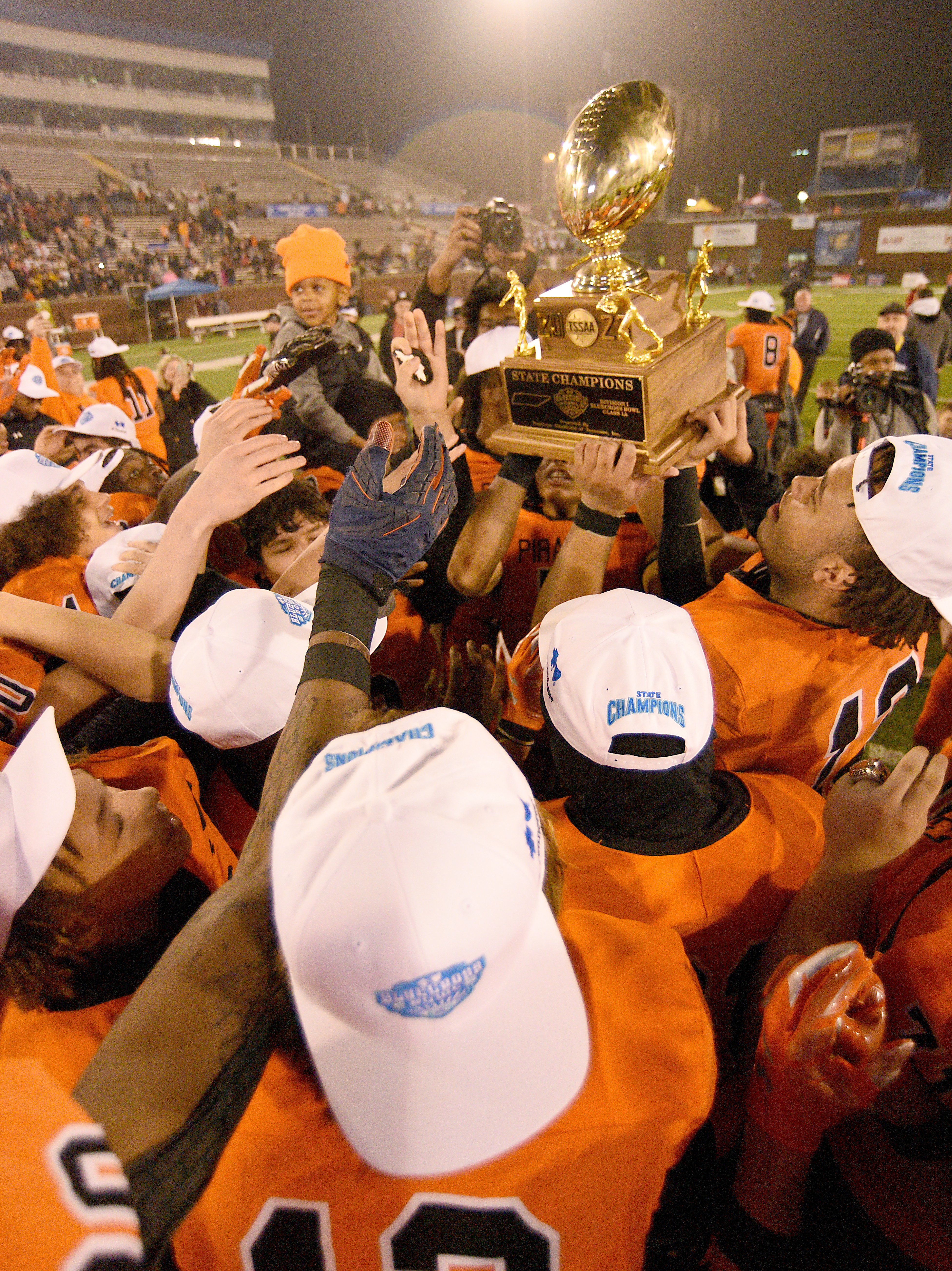 Staff photo by Matt Hamilton/ South Pittsburg players celebrate after defeating McKenzie in the BlueCross Bowl Class 1A championship game at Finley Stadium on Friday, December 1, 2023.