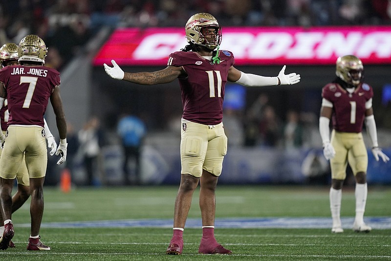 Florida State defensive lineman Patrick Payton reacts after a play during the second half of the team's Atlantic Coast Conference championship NCAA college football game against Louisville, Saturday, Dec. 2, 2023, in Charlotte, N.C. (AP Photo/Erik Verduzco)
