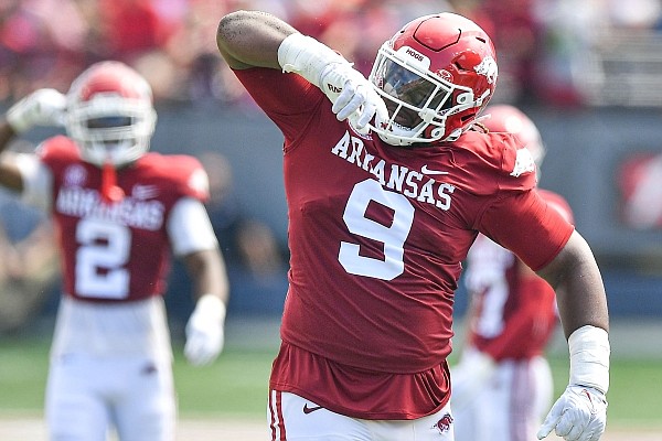 Arkansas defensive lineman Taurean Carter (9) reacts after a tackle, Saturday, Sept, 2, 2023, during the fourth quarter of the RazorbacksÕ 56-13 win over Western Carolina at War Memorial Stadium in Little Rock. Visit nwaonline.com/photo for the photo gallery.