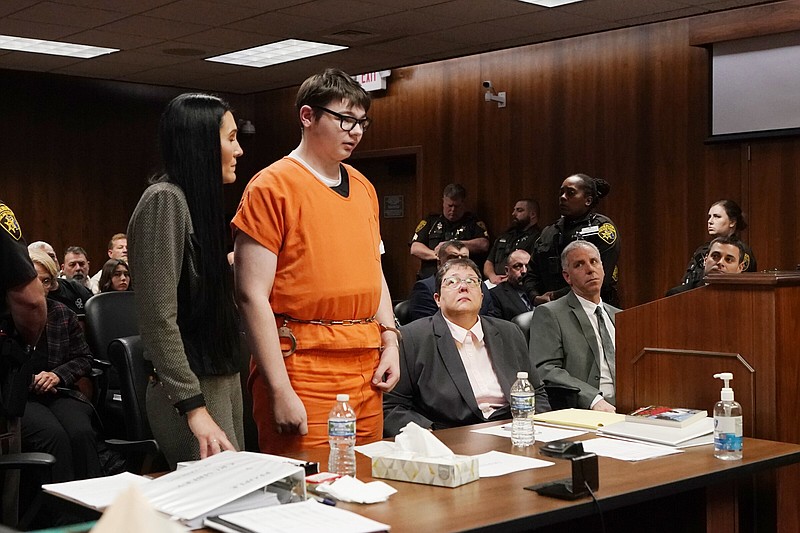 Ethan Crumbley stands and addresses the court before being sentenced Friday in Pontiac, Mich.
(AP/Carlos Osorio)