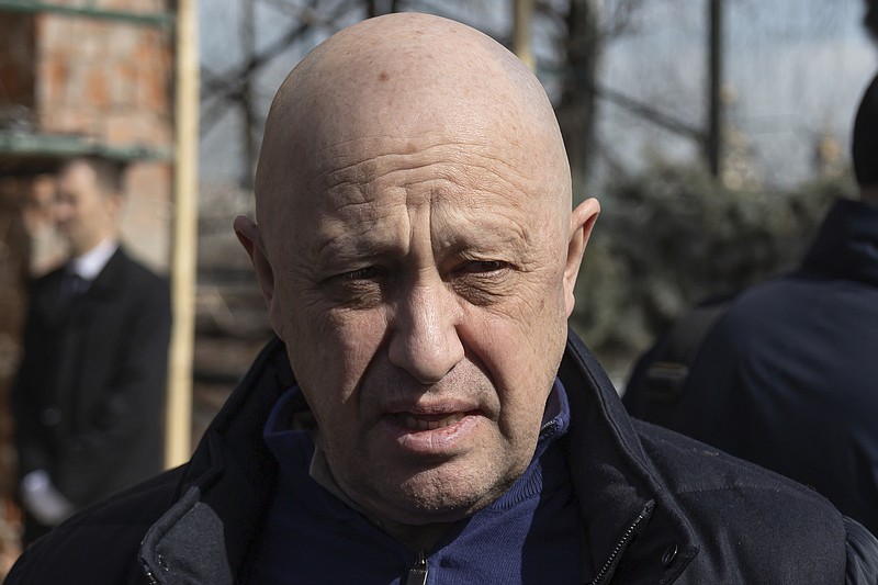 FILE - Yevgeny Prigozhin, the owner of the Wagner Group military company, arrives during a funeral ceremony at the Troyekurovskoye cemetery in Moscow, Russia, Saturday, April 8, 2023. From a hot dog vendor to head of the formidable mercenary army Wagner Group, Prigozhin's rise through Russian society could easily be described as meteoric. But it all came to a sudden end when the plane carrying him and others mysteriously exploded on Aug 23, 2023. (AP Photo, file)
