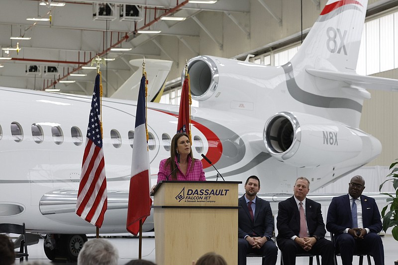Gov. Sarah Huckabee Sanders speaks at a news conference on Tuesday, Dec. 12, announcing the expansion of the Dassault Falcon Jet facility in Little Rock. (Arkansas Democrat-Gazette/Thomas Metthe)