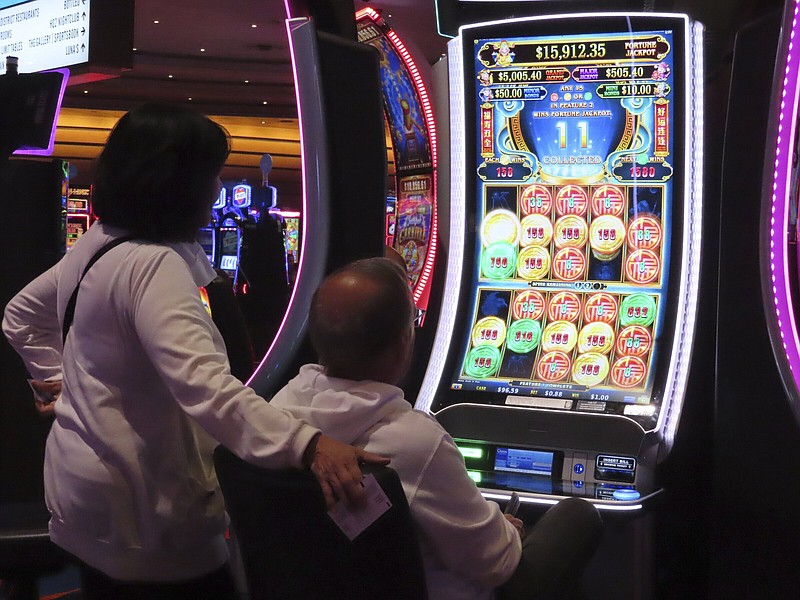 A gambler plays a slot machine at the Ocean Casino Resort in Atlantic City, N.J., in late November.
(AP/Wayne Parry)