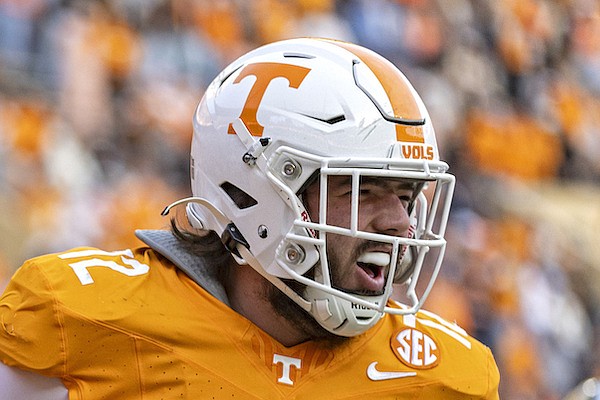 Tennessee offensive lineman Addison Nichols (72)  celebrates a touchdown during the first half of an NCAA college football game against Vanderbilt Saturday, Nov. 25, 2023, in Knoxville, Tenn. (AP Photo/Wade Payne)