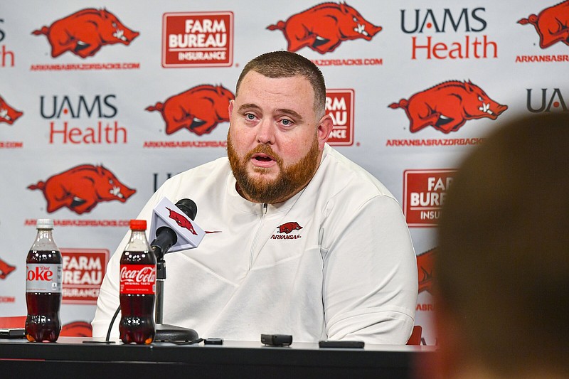Arkansas offensive line coach Eric Mateos speaks during a news conference Wednesday at Reynolds Razorback Stadium in Fayetteville. Mateos served as a graduate assistant from 2013-15 while he earned his master’s degree, helping then-offensive line coach Sam Pittman.
(NWA Democrat-Gazette/Hank Layton)