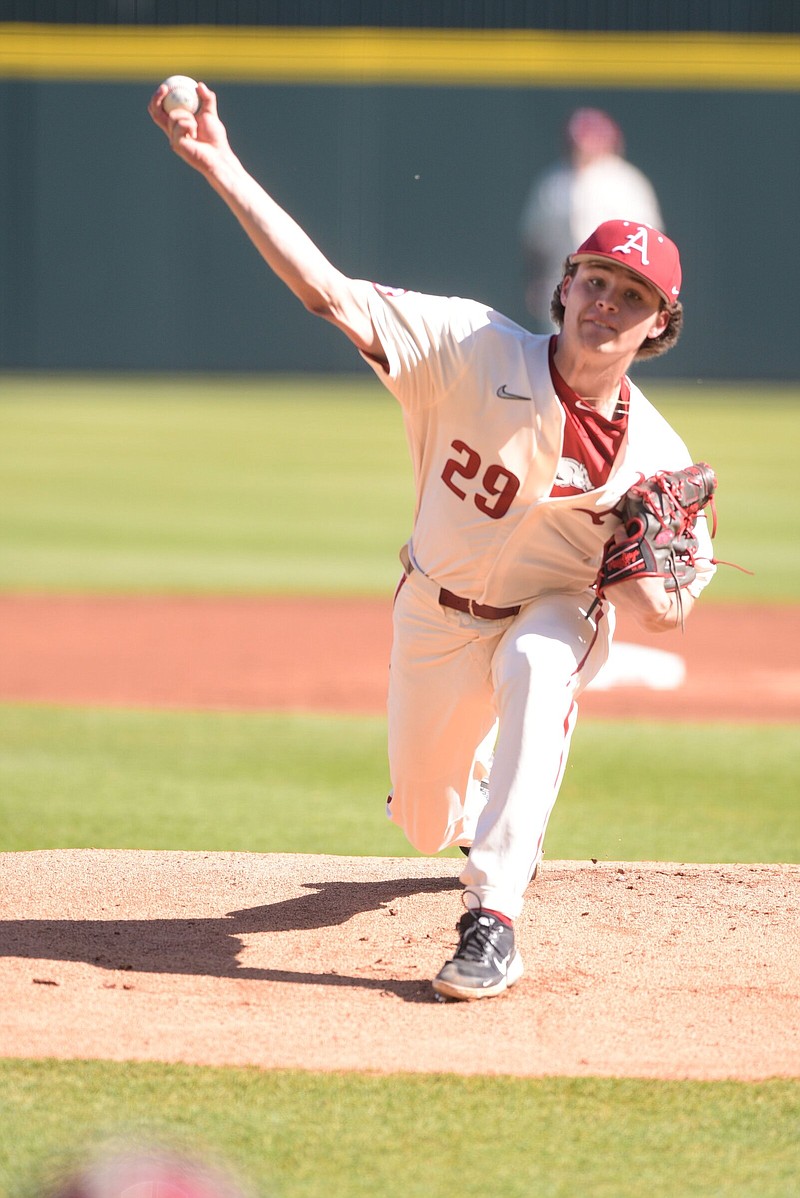 Austin Ledbetter, a pitcher for the University of Arkansas baseball team the past two seasons, will transition to a walk-on quarterback for the Razorbacks’ football team. He was a three-time state champion quarterback at Bryant High School who won the 2020 Landers Award as the state’s best high school football player.
(NWA Democrat-Gazette/Hank Layton)
