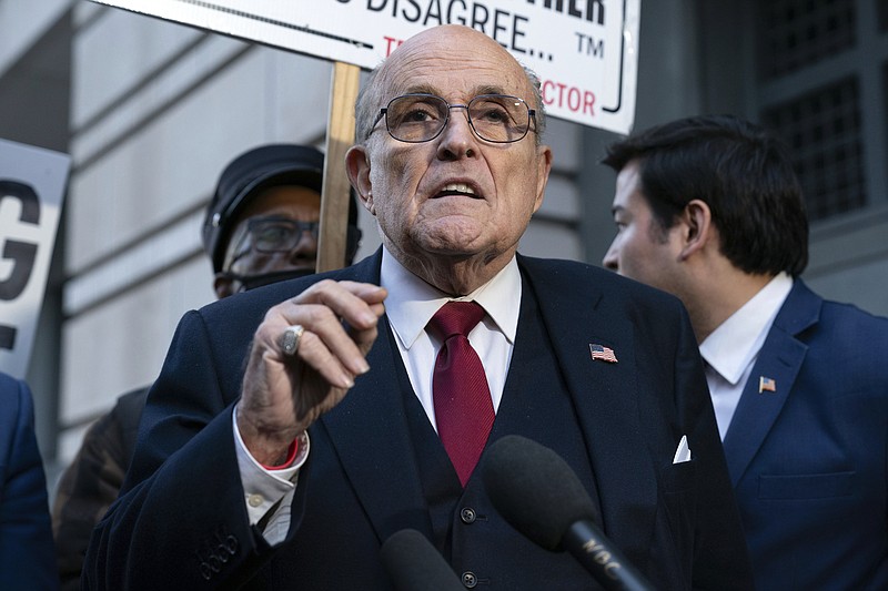 FILE - Former Mayor of New York Rudy Giuliani speaks during a news conference outside the federal courthouse in Washington, Friday, Dec. 15, 2023. Giuliani has filed for bankruptcy, days after being ordered to pay $148 million in a defamation lawsuit. (AP Photo/Jose Luis Magana, File)