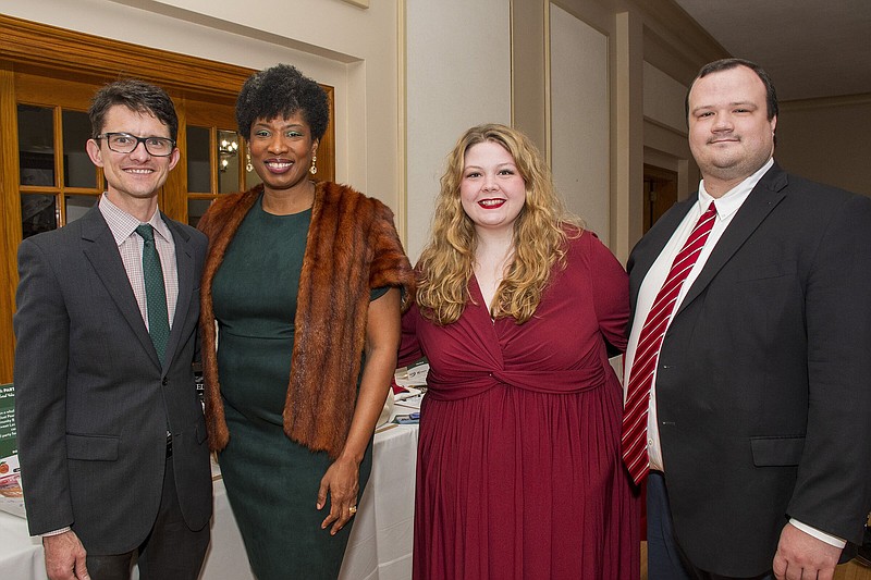 Executive director Ben Goodwin, representative Denise Ennett , Gabrielle Harvey and Drew Martin at  Our House Home for the Holidays held at Albert Pike Memorial Temple on 12/8/2023. 
(Arkansas Democrat-Gazette/Cary Jenkins)