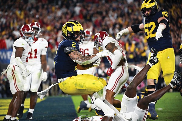 Michigan to play for national title after stopping Alabama 27-20 in overtime - Vimarsana News