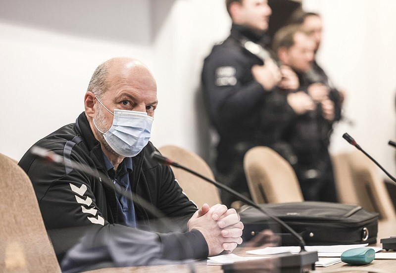 The defendant Thomas Drach sits in the dock in a courtroom in the Cologne Justice Center in Cologne, Germany on Thursday.
(AP/dpa/Oliver Berg)