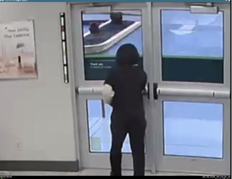 Security camera footage from inside Cadence Bank in Fort Smith shows the person police are seeking in connection with a robbery there on Monday..PHOTO COURTESY OF FORT SMITH POLICE DEPARTMENT