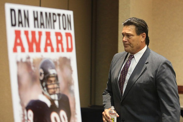 Dan Hampton, a Pro Football Hall of Famer, is shown during a speech to the Little Rock Touchdown Club on Tuesday, Sept. 3, 2013, in Little Rock.