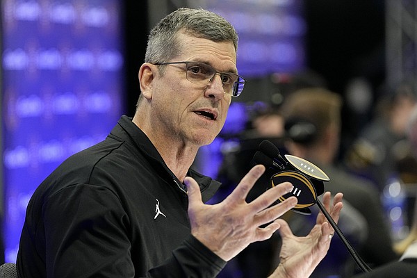 Harbaugh collects bonuses after title | The Arkansas Democrat-Gazette - Vimarsana News