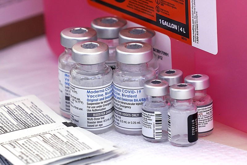 Vaccines for covid-19 and the flu are seen at the L.A. Care and Blue Shield of California Promise Health Plans' Community Resource Center in Lynwood, Calif., in this Oct. 28, 2022 file photo. (AP/Mark J. Terrill)
