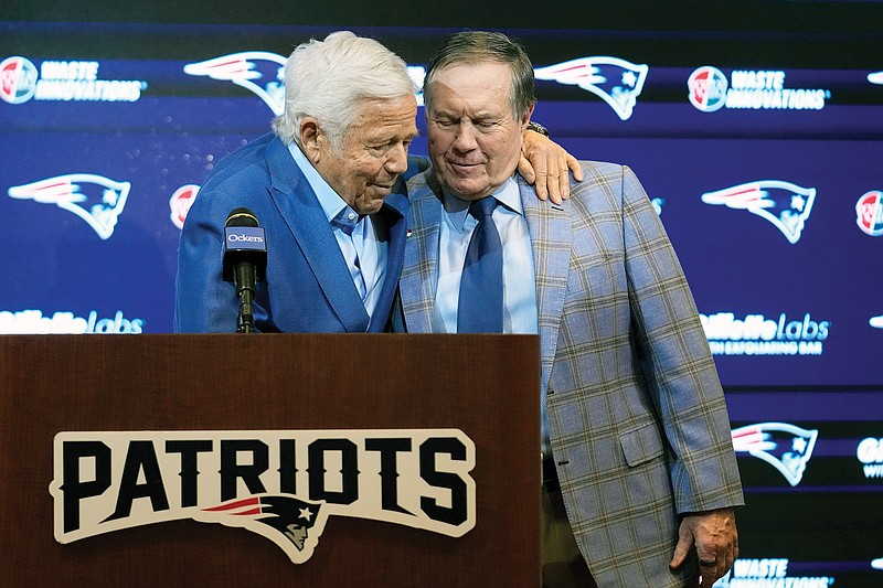 Patriots owner Robert Kraft embraces Bill Belichick during a news conference Thursday in Foxborough, Mass. (Associated Press)