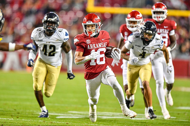 Arkansas wide receiver Isaiah Sategna (16) runs after a catch, Saturday, Nov. 18, 2023, during the second quarter against Florida International at Donald W. Reynolds Razorback Stadium in Fayetteville. Visit nwaonline.com/photo for today's photo gallery..(NWA Democrat-Gazette/Hank Layton)