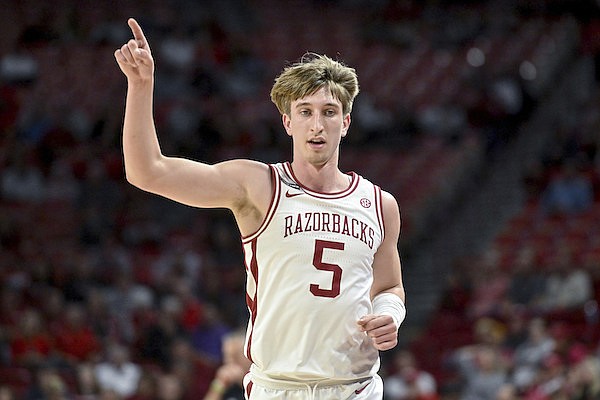 Former Arkansas men's basketball guard Joseph Pinion commits to ...