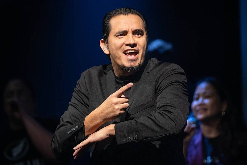 Eduardo Cardenas, founder of Loud n Clear Ministry, led Praise and Worship, a church gathering last weekend in California conducted entirely in American Sign Language. More than 50 deaf and hard of hearing people participated.
(Sacramento Bee, TNS/Cameron Clark)