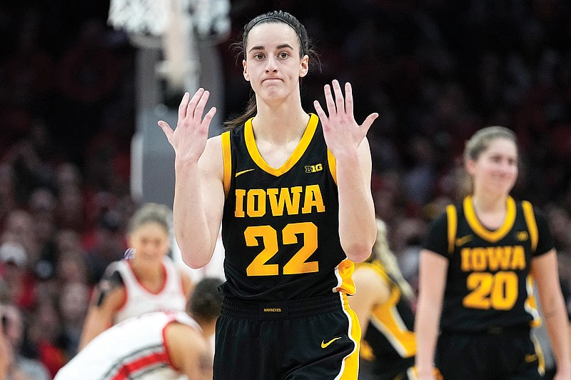 Clark knocked down by Ohio State fan running on court to celebrate win ...