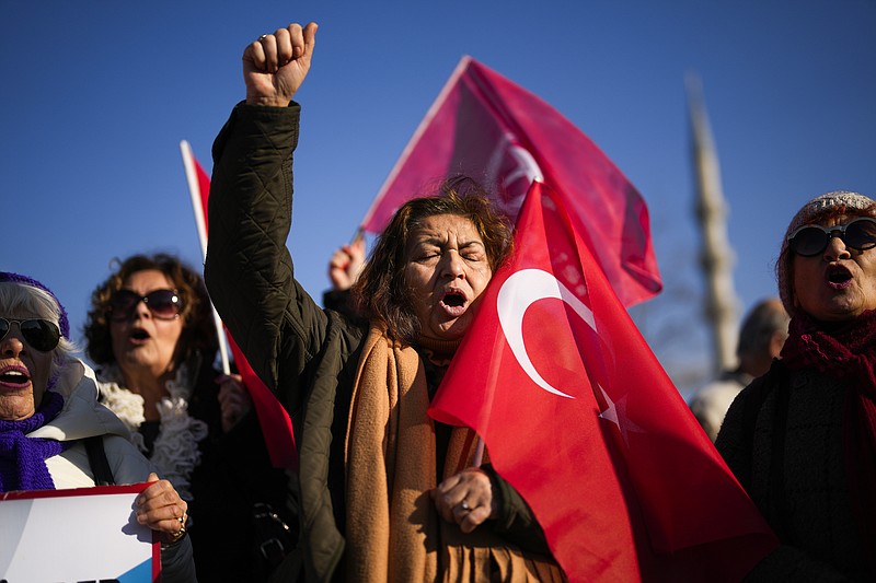 People shout slogans during a protest against the Sweden's NATO membership called by Turkish Vatan, or Patriotic Party, in Istanbul, Turkey, Tuesday, Jan. 23, 2024. Turkish legislators plan to vote Tuesday on Sweden's bid to join NATO, in a step that could remove a major hurdle for the previously nonaligned Nordic country's entry into the military alliance. (AP Photo/Francisco Seco)